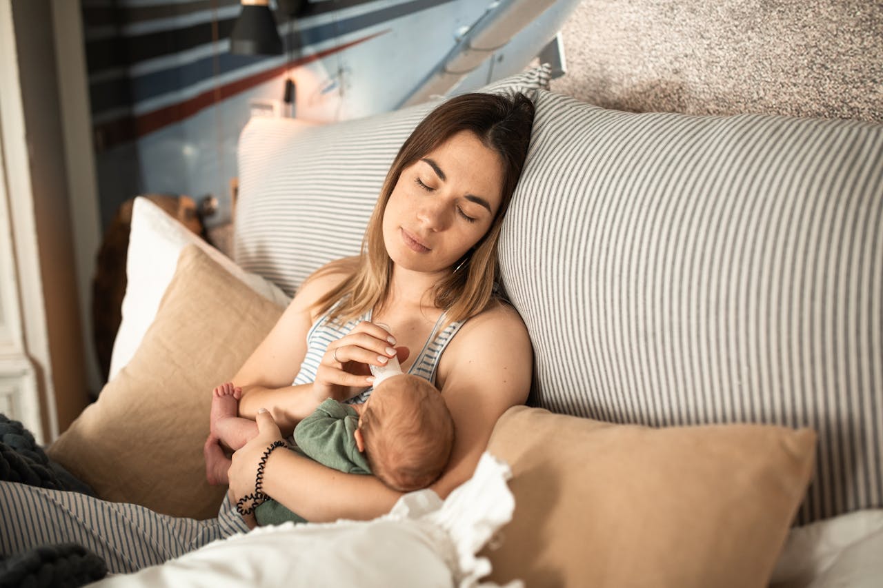 services-img Peaceful moment of a mother and newborn baby relaxing at home.
